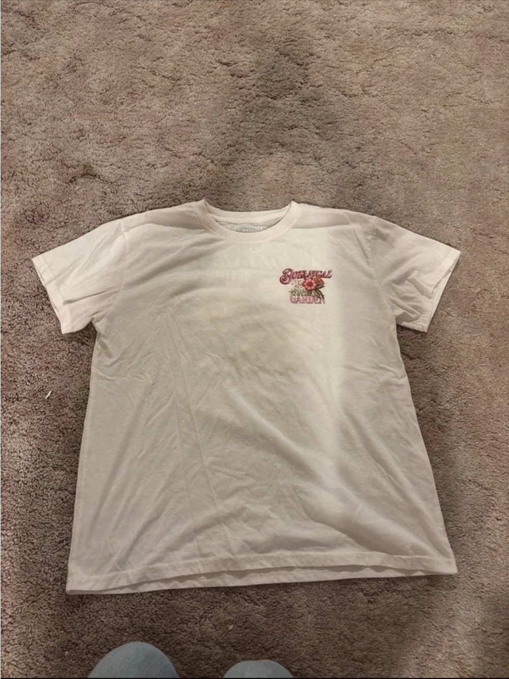 White Graphic Tee with Pink Floral Accent